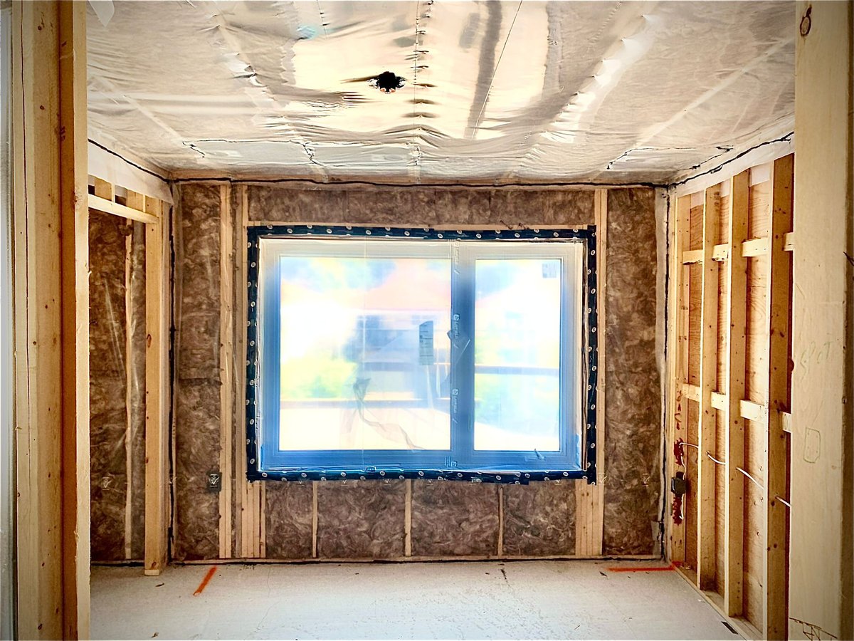 NRG crew installing a building envelope on a Metro Vancouver project